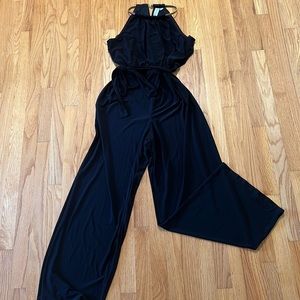 Wide leg, halter neck JUMPSUIT. Wedding/event elegance. Gold neck strap accent.